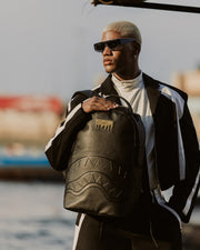 GOLD BRICK DRIP BLACK BACKPACK