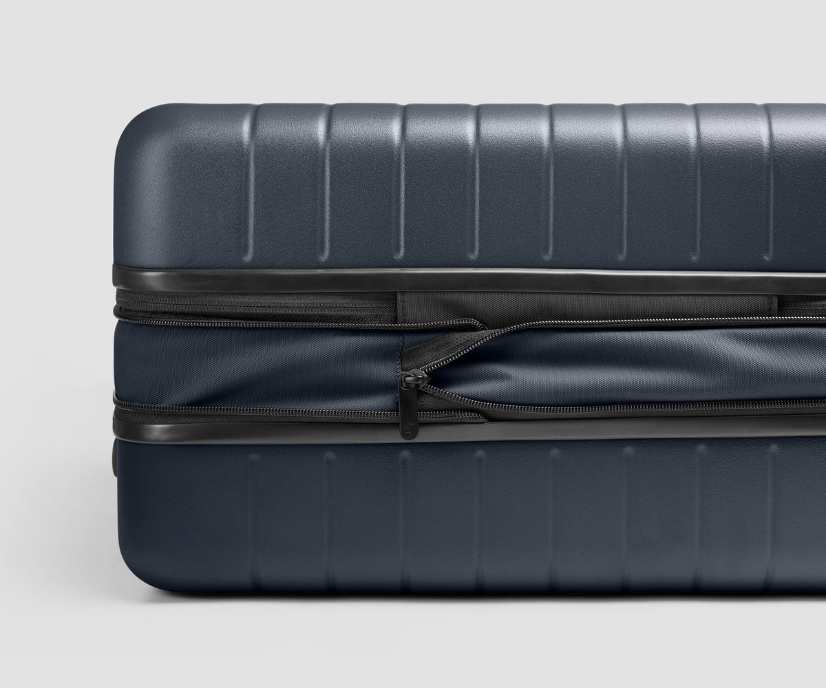 The Carry-On Flex 3 in Navy Blue