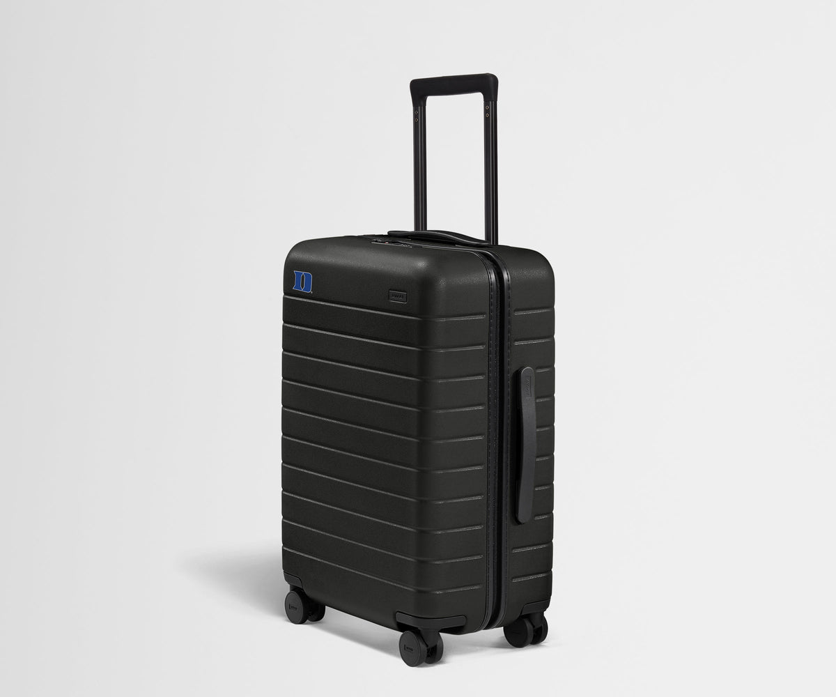 The Collegiate Bigger Carry-On in Duke ®