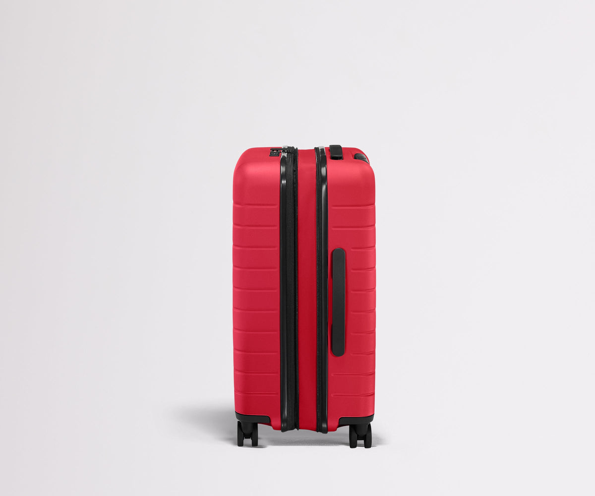 The Bigger Carry-On Flex in Cherry Red