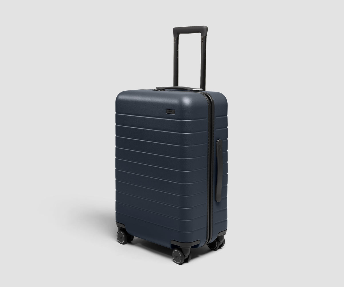 The Bigger Carry-On 3 in Navy Blue