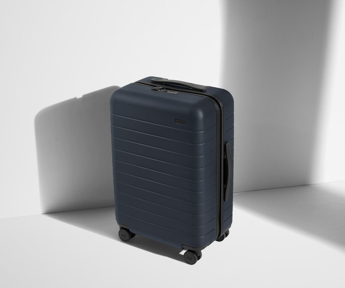 The Bigger Carry-On in Navy Blue
